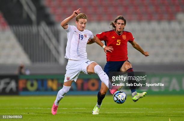 Benjamin Faraas of Norway in action against Yarek Gasiorowski of Spain during the UEFA European Under-19 Championship Finals 2022/23 group B match...