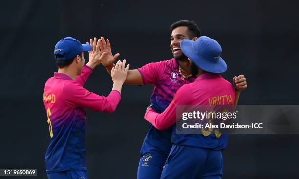 Sanchit Sharma of UAE celebrates the wicket of Ali Khan of USA to win the match during the ICC Men's Cricket World Cup Qualifier Zimbabwe 2023 9th...