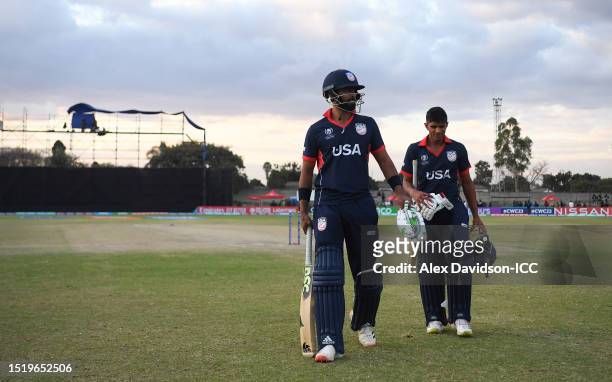 Ali Khan and Nosthush Kenjige of USA make their way off following the ICC Men's Cricket World Cup Qualifier Zimbabwe 2023 9th and 10th Playoff match...