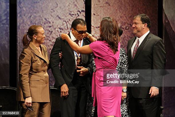 Lonnie Ali, former boxing Champion Muhammad Ali, Laila Ali and President and CEO of the Nation Constitution Center David Eisner during a ceremony at...