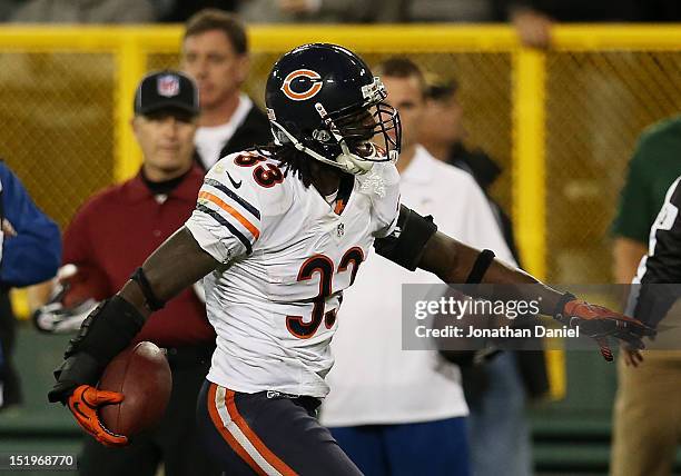 Cornerback Charles Tillman of the Chicago Bears reacts after recovering a fumble in the third quarter against the Green Bay Packers at Lambeau Field...