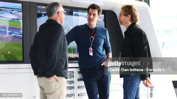 Joseph Kosinski and Jerry Bruckheimer, director and producer of the upcoming Formula One movie, Apex, talk in the Paddock during previews ahead of...