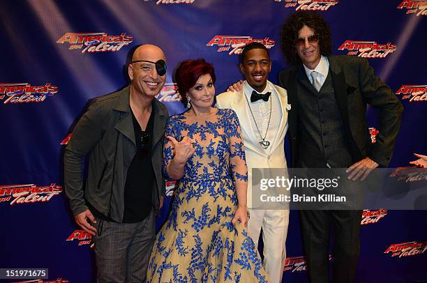 The four judges of AGT Season 7, Howie Mandel, Sharon Osbourne, Nick Cannon, and Howard Stern, attend the America's Got Talent Finale Live Show red...