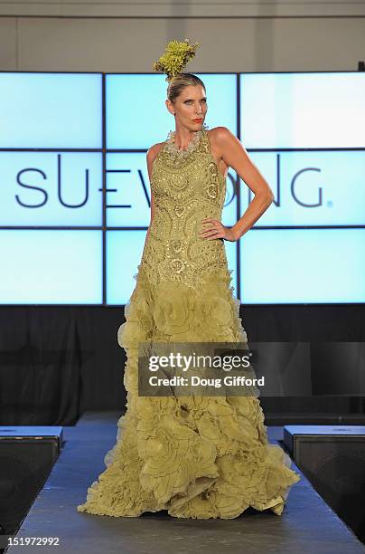 Model walks the runway at the 2012 Sue Wong "Autumn Sonata" collection Fashion Show during the sixth annual Designer Runway event on September 13,...