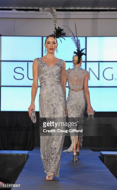 Models walk the runway at the 2012 Sue Wong "Autumn Sonata" collection Fashion Show during the sixth annual Designer Runway event on September 13,...