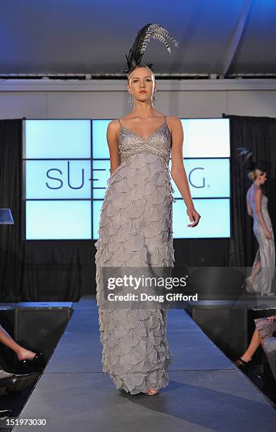 Model walks the runway at the 2012 Sue Wong "Autumn Sonata" collection Fashion Show during the sixth annual Designer Runway event on September 13,...