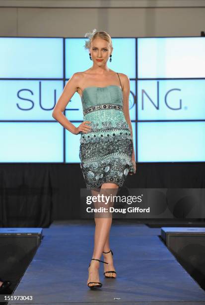 Model walks the runway at the 2012 Sue Wong "Autumn Sonata" collection Fashion Show during the sixth annual Designer Runway event on September 13,...