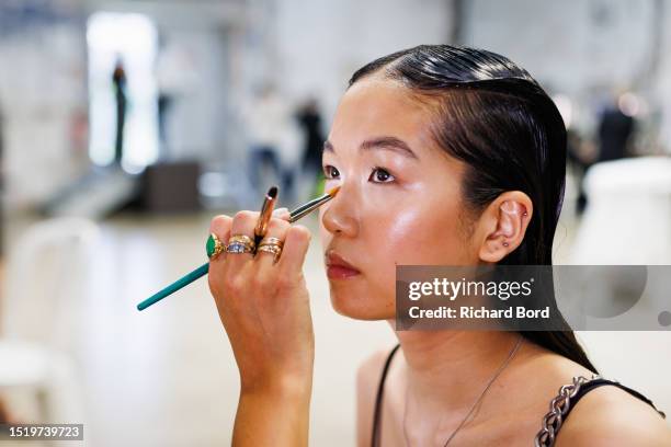 Model prepares backstage prior to the Gaurav Gupta Haute Couture Fall/Winter 2023/2024 show at Palais de Tokyo as part of Paris Fashion Week on July...