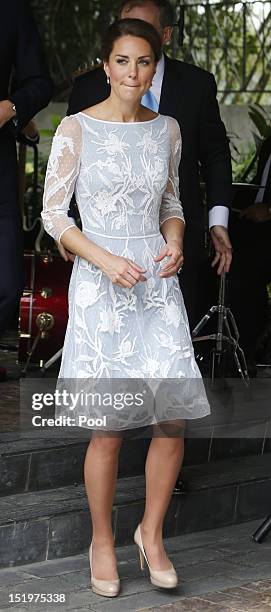 Catherine, Duchess of Cambridge attends a tea party at the British High Commission on day 4 of Prince William, Duke of Cambridge and Catherine,...