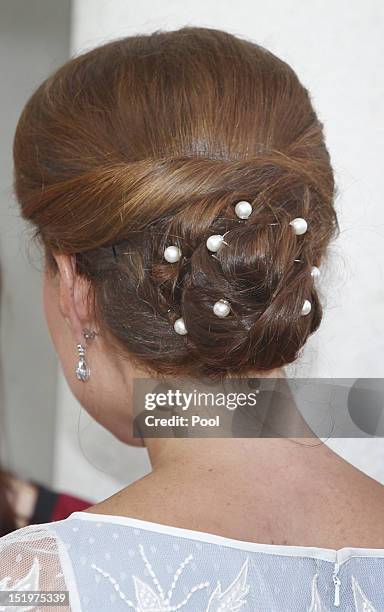 Catherine, Duchess of Cambridge attends a tea party at the British High Commission on day 4 of Prince William, Duke of Cambridge and Catherine,...