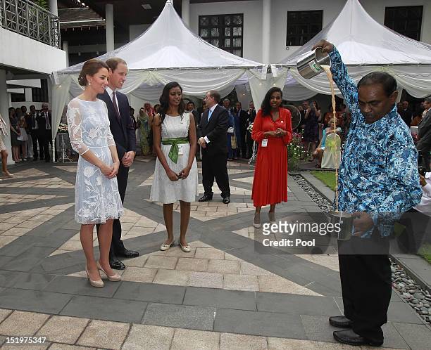 Prince William, Duke of Cambridge and Catherine, Duchess of Cambridge attend a tea party at the British High Commission on day 4 of Prince William,...