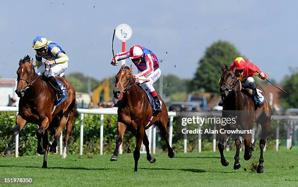 Johnny Murtagh riding Sir Prancealot win The Polypipe Flying Childers Stakes at Doncaster racecourse on September 14, 2012 in Doncaster, England.