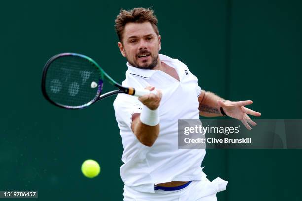 Stan Wawrinka of Switzerland plays a forehand against Tomas Martin Etcheverry of Argentina during day four of The Championships Wimbledon 2023 at All...