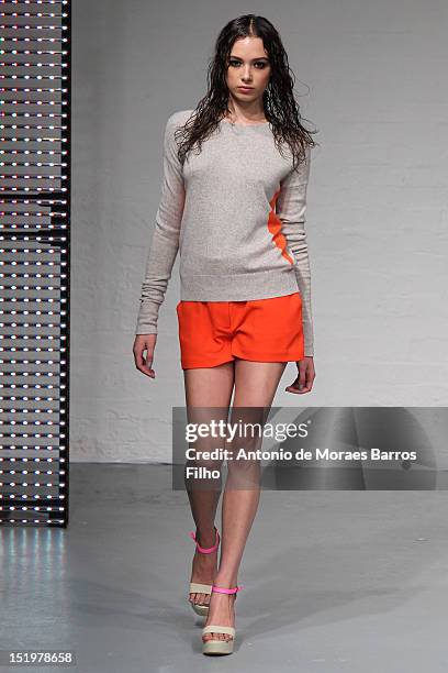 Model showcases designs on the catwalk by Zoe Jordan on day 1 of London Fashion Week Spring/Summer 2013, at Mercer Street Studios on September 14,...