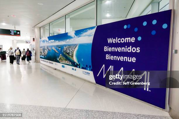 Miami, Florida, MIA Miami International Airport, terminal Welcome to Miami banner.