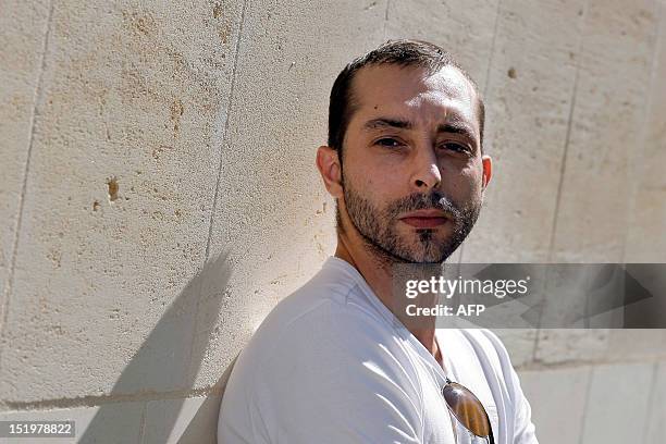 Christophe Varagnac, a teacher at the Tregey high school who was beaten up by a pupil following a row over a lesson on Morocco, poses in a street of...