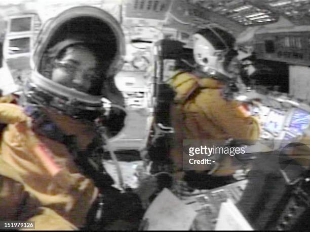 In this NASA video made available 28 February space shuttle Columbia commander Rick Husband goes through routine entry procedures as astronaut...