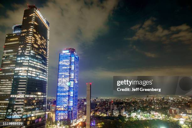 Mexico City, Mexico, view of skyline at night with Chapultepec Uno, R509, Torre Mayor, Torre BBVA.