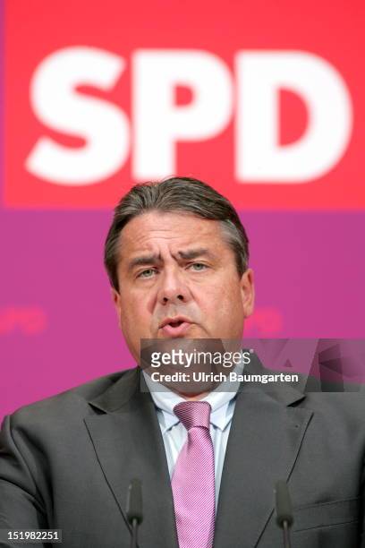 Sigmar Gabriel, Chairman of the German Social Democrats , adresses the media during a press conference following a meeting of the party's executive...