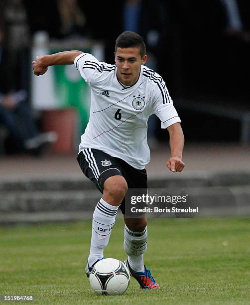 Ufuk Akyol of Germany runs with the ball during the U16 International Friendly match between Germany and Ukraine on September 14, 2012 in...