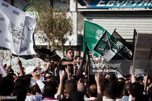 An Egyptian protester chants during a protest following midday prayers in Tahrir Square on September 14, 2012 in Cairo, Egypt. Over two hundred...