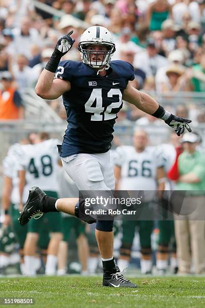 Michael Mauti of the Penn State Nittany Lions celebrates a play against the Ohio Bobcats at Beaver Stadium on September 1, 2012 in State College,...