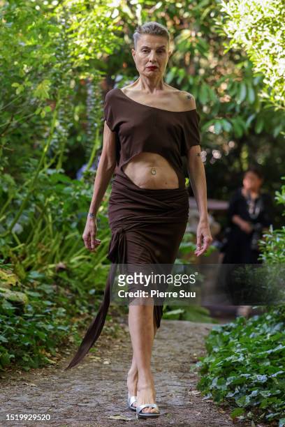 Elli Medeiros walks the runway during the Adeline André Haute Couture Fall/Winter 2023/2024 show as part of Paris Fashion Week on July 06, 2023 in...