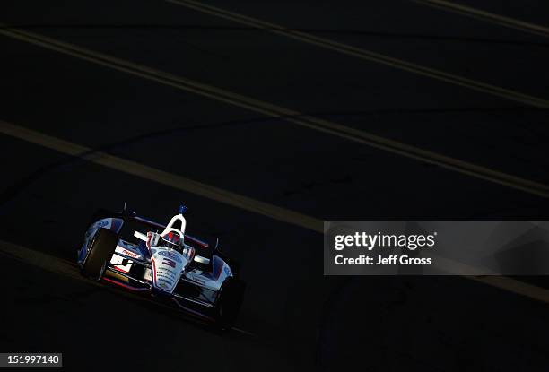 Helio Castroneves of Brazil drives the Auto Club Team Penske Chevrolet Dallara during practice for the IZOD IndyCarSeries MATV 500 World Championship...