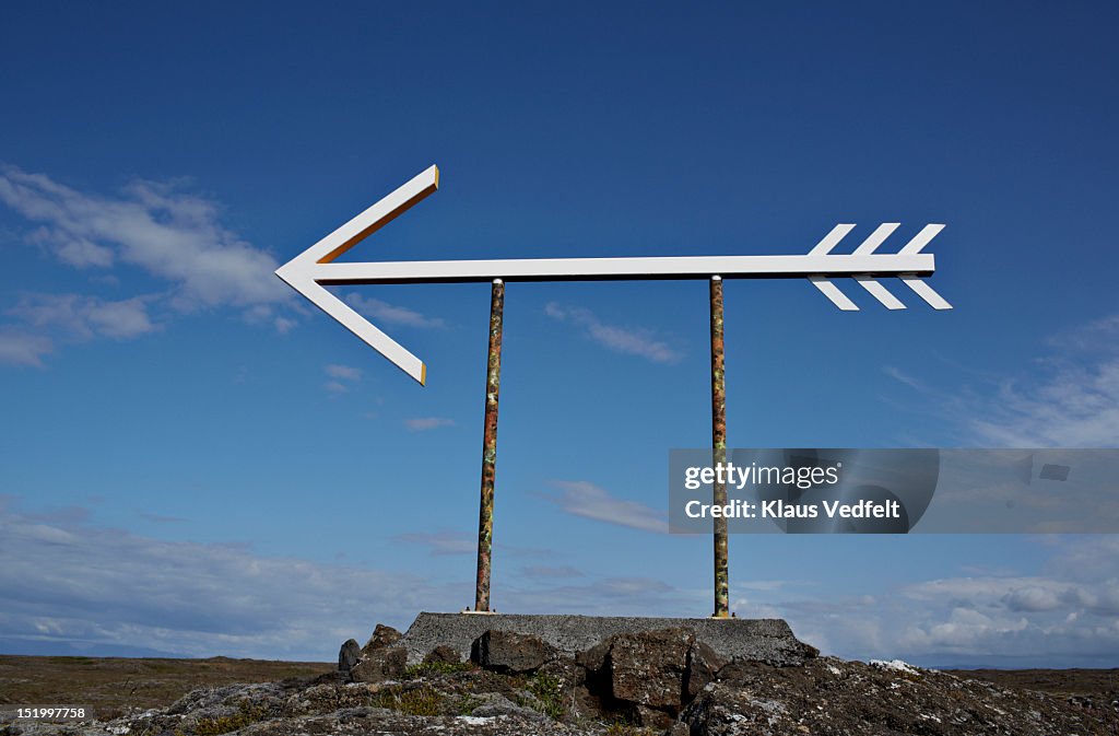 Arrow in lava landscape