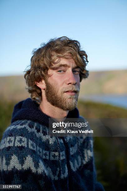portrait of male backpacker smiling confident - wavy hair man stock pictures, royalty-free photos & images
