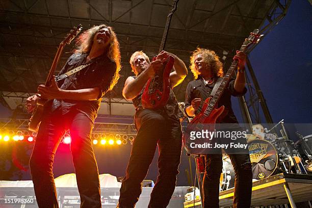 Joel Hoekstra, Brad Gillis, Jack Blades, and Kelly Keagy of the American hard rock band Night Ranger perform onstage at White River State Park on...