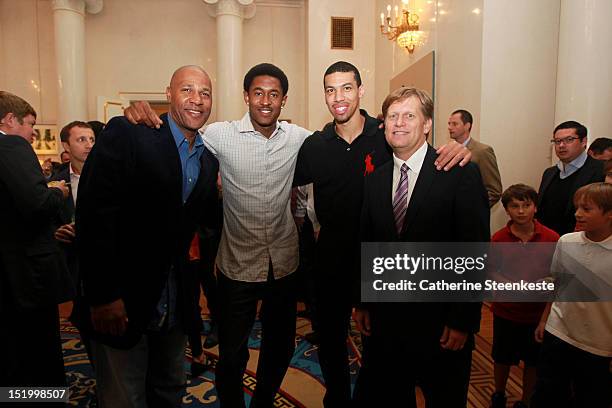 Mario Elie Assistant Coach of the Brooklyn Nets, MarShon Brooks of the Brooklyn Nets, Danny Green of the San Antonio Spurs are posing for a picture...