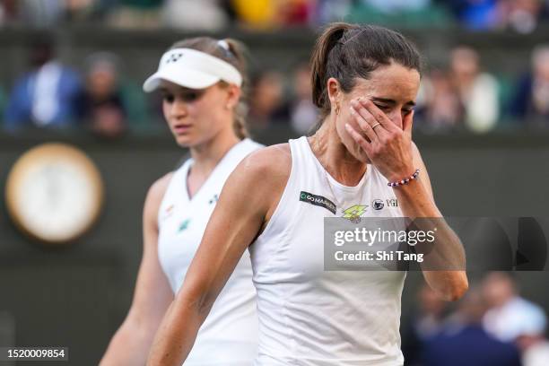 Alize Cornet of France gets an injury in the Women's Singles second round match against Elena Rybakina of Kazakhstan during day four of The...