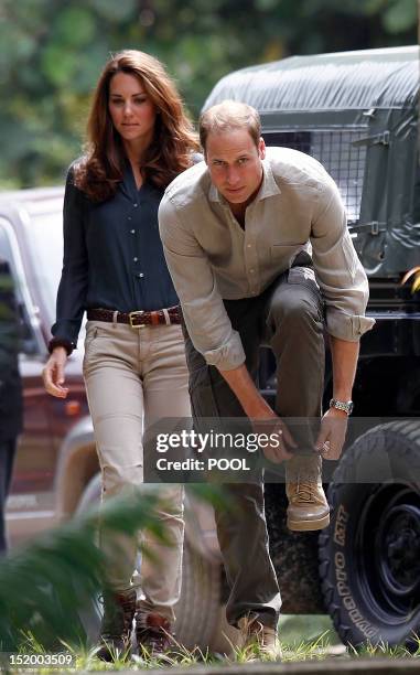 Britain's Prince William and Catherine, the Duchess of Cambridge arrive at the Borneo Rainforest Research Center in Danum Valley, some 70 kilometers...