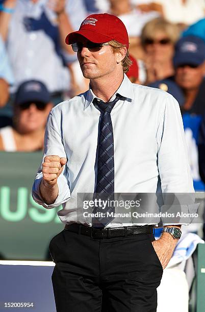 Team captain Jim Courier of the United States reacts during day one of the semi final Davis Cup between Spain and the United States at the Parque...