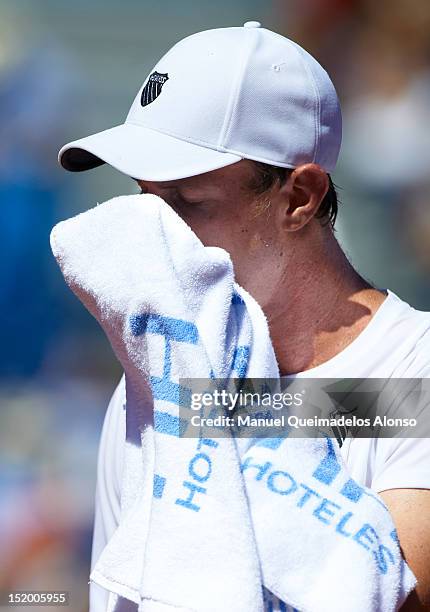 Sam Querrey of the United States reacts in his match against David Ferrer of Spain during day one of the semi final Davis Cup between Spain and the...