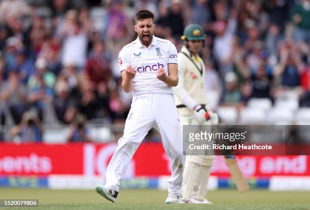 Mark Wood of England celebrates dismissing Australia captain Pat Cummins during Day One of the LV= Insurance Ashes 3rd Test Match between England and...