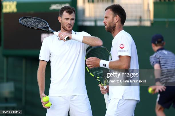 Jamie Murray of Great Britain and Michael Venus of Poland interact against Albano Olivetti of France and David Vega Hernandez of Spain in the Men's...