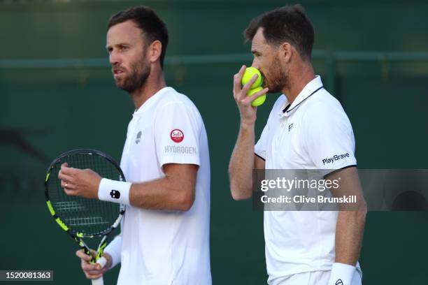 Jamie Murray of Great Britain and Michael Venus of Poland interact against Albano Olivetti of France and David Vega Hernandez of Spain in the Men's...