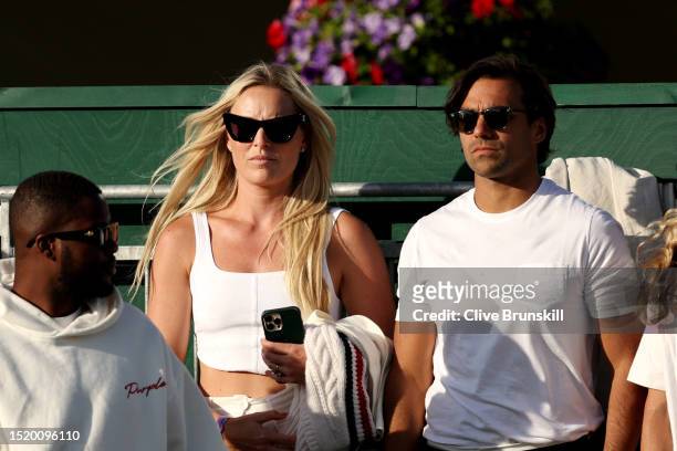 Former alpine skiier Lindsey Vonn and partner Diego Osorio watch on during day four of The Championships Wimbledon 2023 at All England Lawn Tennis...