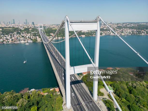 aerial view of the second bosphorus bridge or fatih sultan mehmet bridge, istanbul. - bosphorus bridge stock pictures, royalty-free photos & images