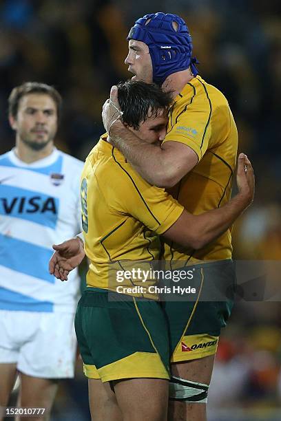 Nathan Sharpe and Nick Phipps of the Australian Wallabies celebrate winning the Rugby Championship match between the Australian Wallabies and...