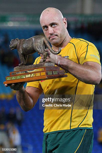 Nathan Sharpe of the Australian Wallabies holds The Puma Trophy after winning the Rugby Championship match between the Australian Wallabies and...