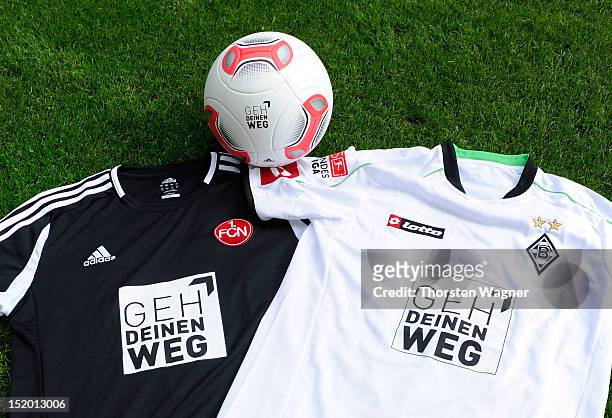 Shirts and the playball with special brands are pictured prior to the Bundesliga match between Borussia Moenchengladbach and 1.FC Nuernberg at...
