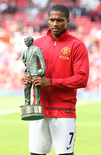 Antonio Valencia of Manchester United poses with his Sir Matt Busby Player of the Year award for 2011/12 ahead of the Barclays Premier League match...