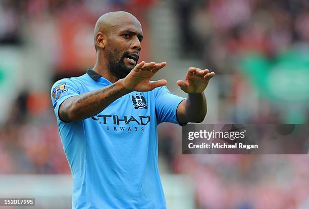 Maicon of Manchester City gestures during the Barclays Premier League match between Stoke City and Manchester City at the Britannia Stadium on...