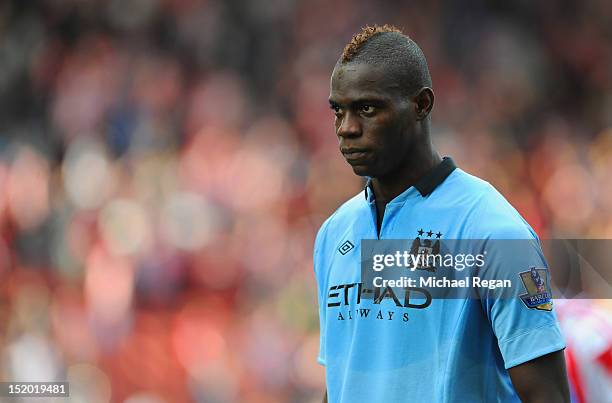 Mario Balotelli of Manchester City looks on during the Barclays Premier League match between Stoke City and Manchester City at the Britannia Stadium...