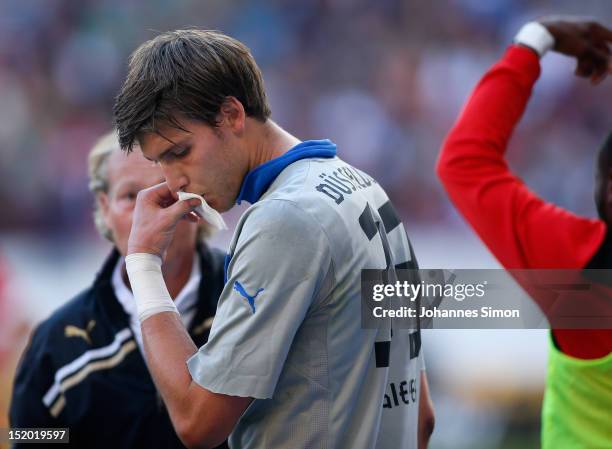 Fabian Giefer, goalkeeper of Duesseldorf is injured during the Bundesliga match between VfB Stuttgart and Fortuna Duesseldorf at Mercedes-Benz Arena...