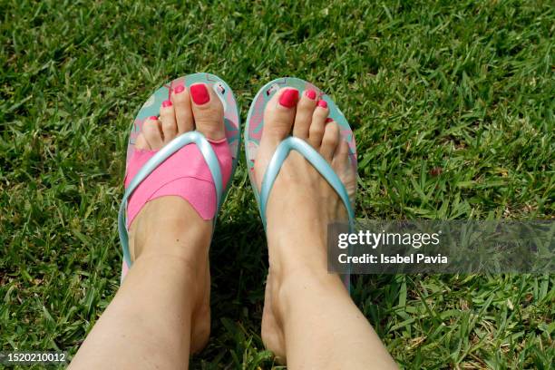 woman's foot with a pink bandage - pair stock pictures, royalty-free photos & images