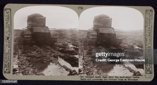 Our whippet tanks dash thro' the mud-caked battlefields and penetrate the German lines at Morcourt, France, ca. 1918.